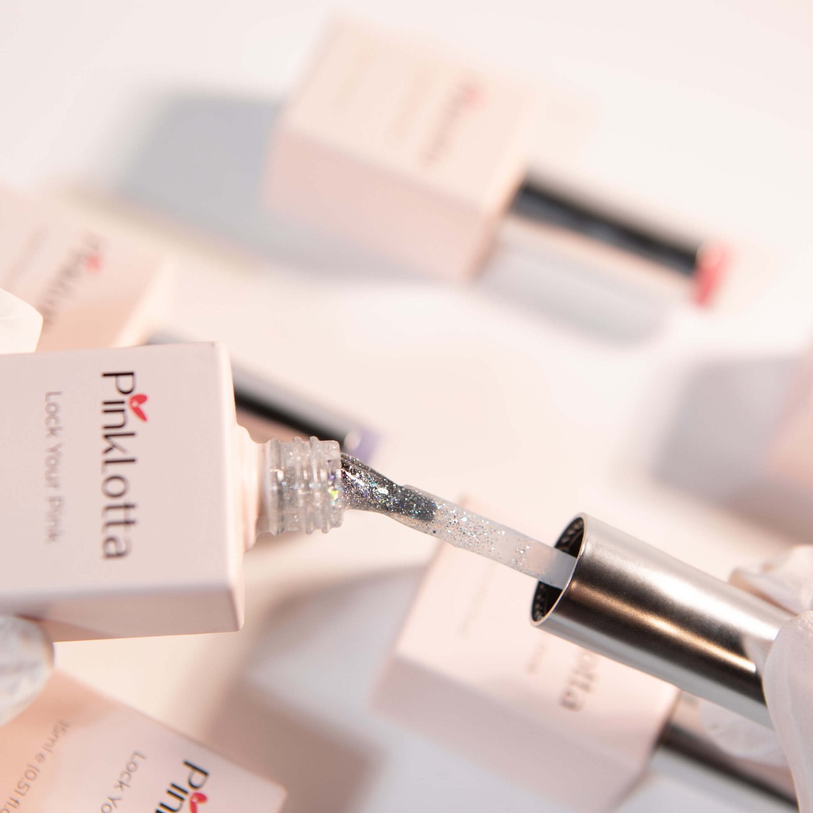 PinkLotta Color Gel GH803 Gleam — silver glitter gel polish brush close-up, high-shine sparkles